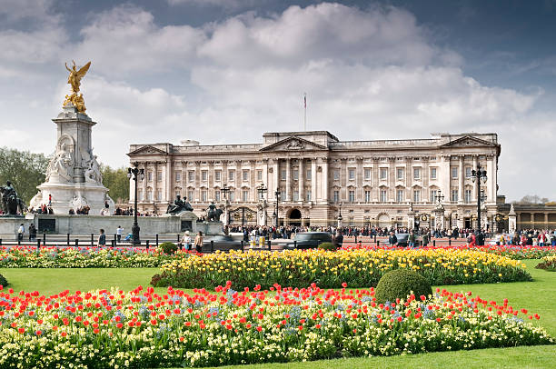 Buckingham Palace, London "London, England - April 18, 2009, Buckingham Palace and visitors at spring time." buckingham palace photos stock pictures, royalty-free photos & images