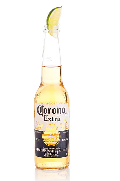 Corona Extra Beer Bottle with Lime (12 oz size) stock photo