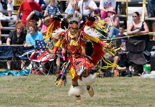 Young male Traditional Dancer performs at a  Powwow stock photo
