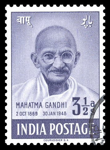 London, UK – January 15, 2012: Vintage India postage stamp of 1948 showing an engraved portrait of Mahatma Gandhi, issued to celebrate the first anniversary of India\\'s independence