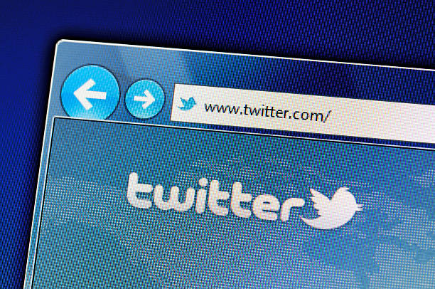 Twitter website on computer screen "Muenster, Germany - May 23, 2011: The twitter website is displayed in web browser on a computer screen. Twitter is a social networking and microblogging service and enabling its users to send and read messages." online messaging stock pictures, royalty-free photos & images
