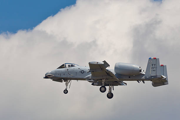 Fairchild A-10 Thunderbolt II "Washington, USA - May 21, 2011: Fairchild A-10 Thunderbolt II performing air show routine during the Joint Services Open House hosted by Andrews AFB located in Washington, DC. A-10 is also called Tankbuster." a10 warthog stock pictures, royalty-free photos & images