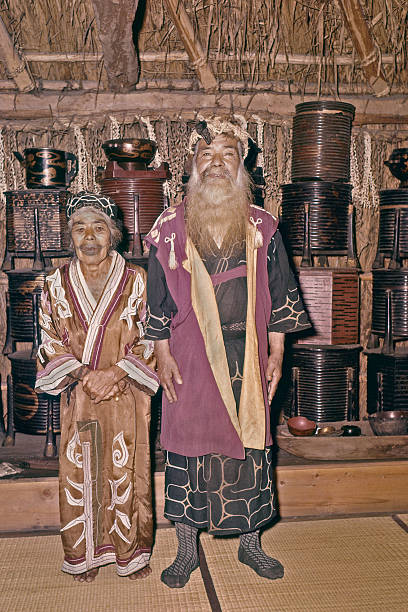 Ainu couple inside. stock photo