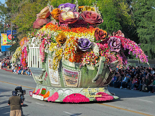 Rose Bowl Parade on January 1, 2010 "Pasadena, California, USA - January 1, 2010: The Bayer Advanced float named: We Are The Champions, won the Queen\'s Trophy in the 121rd Tournament of Roses Parade." parade photos stock pictures, royalty-free photos & images