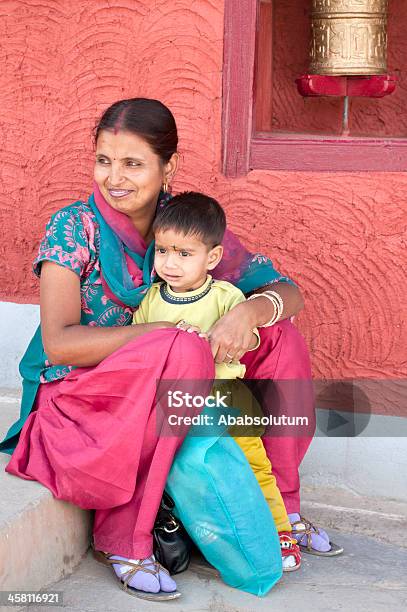 Indian Woman With Child Thikse Gompa Ladakh Stock Photo - Download Image Now - 30-39 Years, Adult, Arm Around
