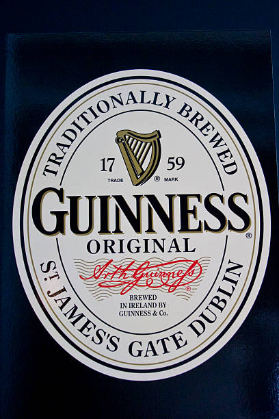 Guinness logo "Dublin , Ireland - May 29, 2011:The famous Guinness logo belonging to the Guinness brewery in Dublin Ireland. Guinness is known the world over and is famously linked to the St James`s gate brewery in Dublin , Ireland" guinness photos stock pictures, royalty-free photos & images