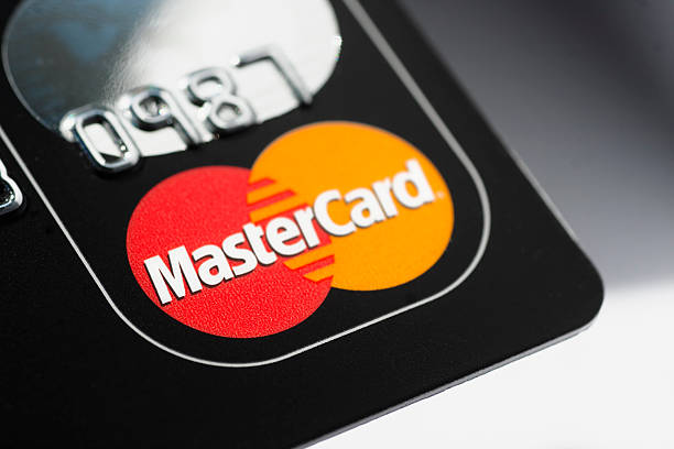 cartão de crédito mastercard - brand name yellow red business imagens e fotografias de stock