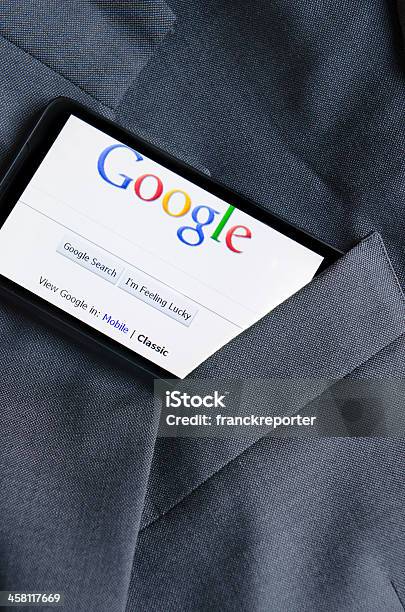 Smart Phone With Google In The Pocket Of Jacket Stock Photo - Download Image Now - Search Engine, Google - Brand-name, Telephone