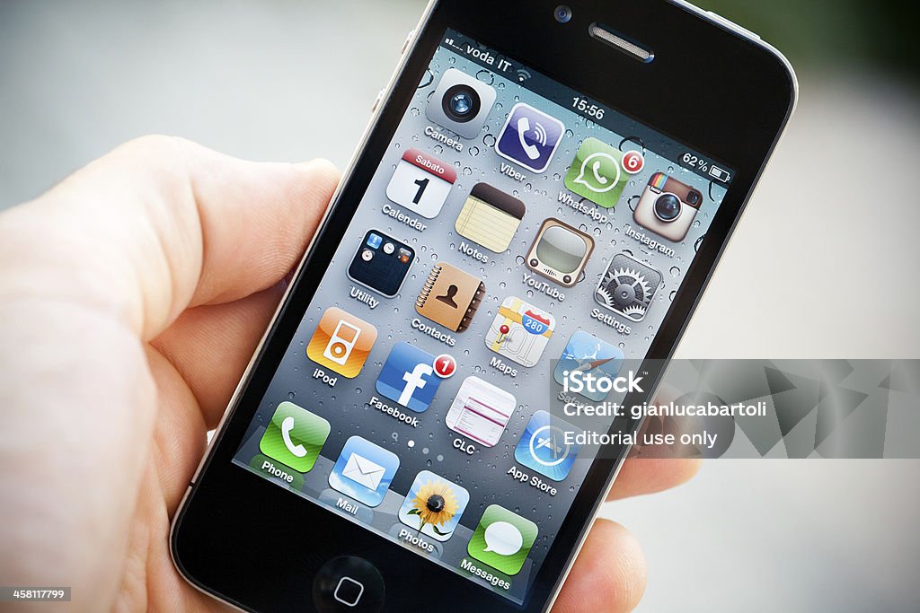 Home page di iPhone 4 - Foto stock royalty-free di Lente a contatto