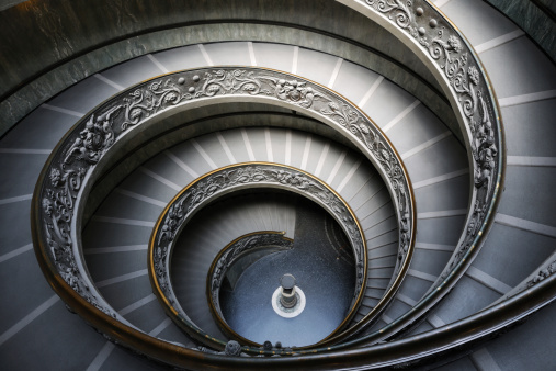 Rome, Italy - June 4, 2011: The old stairway inside the Vatican museum in Rome, Italy