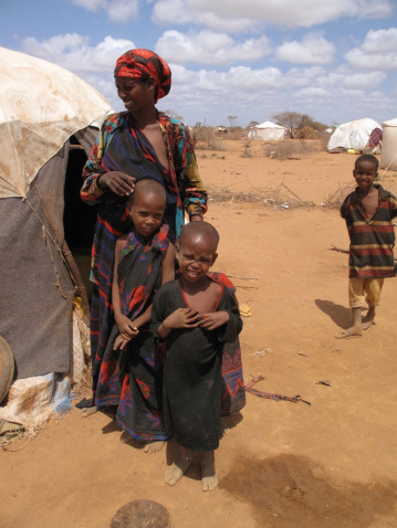 Dadaab, Somalia - August 15, 2011: Unidentified children live in the Dadaab refugee camp where thousands of Somalis wait for help because of hunger on August 15, 2011 in Dadaab, Somalia