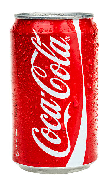 Isolated Chilled Coca Cola "Tel-Aviv, Israel - March 20th, 2011: Frontal view of a cold 0.33L Original Coca-Cola can, sweating drops of water due to its friskiness. Isolated on white background." canister photos stock pictures, royalty-free photos & images