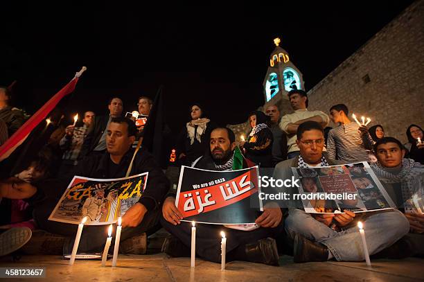 Palestinians Protest Gaza Attacks Stock Photo - Download Image Now - 2018 Gaza Border Protests, Activist, All Middle Eastern Flags