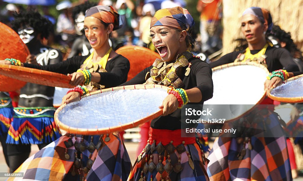 Aliwan Fiesta "Manila, Republic of the Philippines- April 14, 2012: Participants of 10th Aliwan Fiesta, an annual event that gathers different cultural festivals from the entire Philippines wherein contingents compete in street dancing parade and float competitions, as well as in a beauty pageant." Dancing Stock Photo