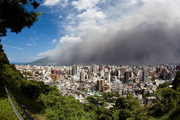 Winds bring  ash  to Kagoshima City after eruption  volcano Sakurajima stock photo