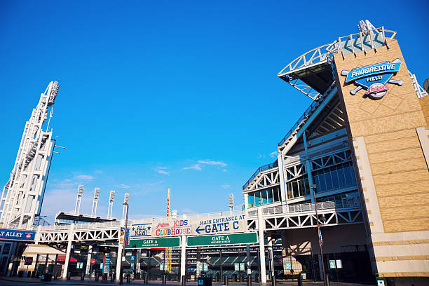 Progressive Field "Cleveland, Ohio, USA - August, 21 2012: Progressive Field stadium in the center of Cleveland. The stadium was opened in 1992 and is home to Cleveland Indians - baseball team from the Central Division of American Baseball League. The stadium currently has the capacity of 43000 people. Seen during summer afternoon." american league baseball stock pictures, royalty-free photos & images