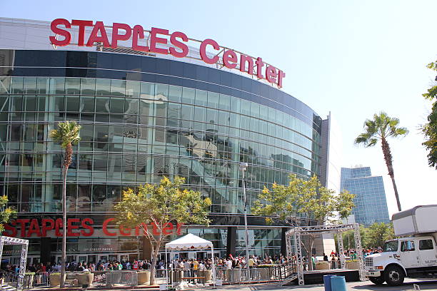 Staples Center "Los Angeles, CA, USA - August 20, 2012: A crowd of people gather outside the exterior of the Staples Center in downtown Los Angeles for an event. Staples Center contains stadium seating for 14,000 people and houses world class sports teams such as the Los Angeles Lakers and Los Angeles Clippers." los angeles kings stock pictures, royalty-free photos & images