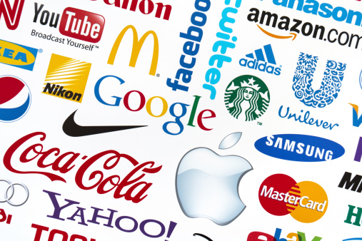 Kiev, Ukraine - February 21, 2012: A logotype collection of well-known world brand's printed on paper. Include Google, Mc'Donald's, Nike, Coca-Cola, Facebook, Apple, Yahoo, Nikon, YouTube, Adidas, Amazon.com, Unilever, Twitter, Mastercard, Samsung, Canon and Starbuck's logos.