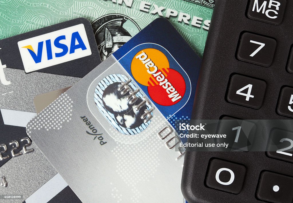 Cartões de crédito e Calculadora - Foto de stock de Mastercard royalty-free