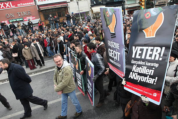 Journalist Hrant Dink memorial in Istanbul "Istanbul,Turkey - January 19, 2012: Thousands marched for the fifth anniversary of Armenian journalist Hrant Dinkaas murder. People held a banner that read, We are all Armenians, we are all Hrant" hrant dink stock pictures, royalty-free photos & images