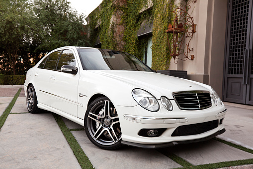 Scottsdale, United States - January 11, 2011: A photo of a parked black Mercedes Benz CLK500 sedan. Mercedes is known for its high end luxury vehicles.