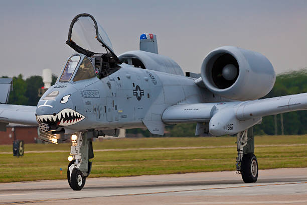 Fairchild A-10 Thunderbolt II "Langley, USA - May 15, 2011:  Fairchild A-10 Thunderbolt II performing air show routine during the Power Over Hampton Roads Air Show. A-10 is also called Tankbuster." a10 warthog stock pictures, royalty-free photos & images