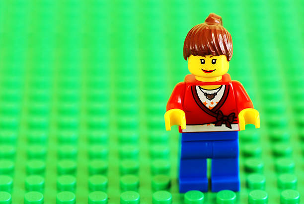 Borgosesia, Italy - October 13, 2011: Lego woman portrait with copy space. Built with the famous Lego construction block toys. Studio shot.