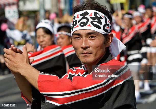 Japanese Man Leads A Line Of Festival Dancers Stock Photo - Download Image Now - Adult, Arts Culture and Entertainment, Asia