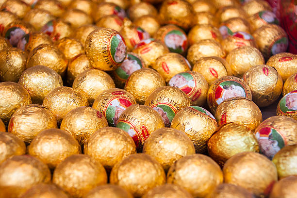 Mozart Ball Austria, Salzburg, June 22,2012: Selective focus on a display with Mozartkugeln (Mozart Balls) It was created by the Salzburg confectioner, Paul Fürst, in 1890 and named after Wolfgang Amadeus Mozart. The Mirabell firm, based in Grödig near Salzburg, chose the name, “Real Salzburg Mozartkugeln wolfgang amadeus mozart photos stock pictures, royalty-free photos & images