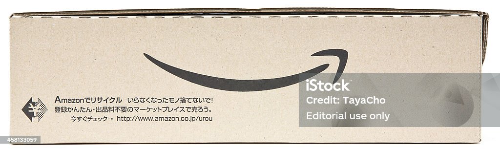 Amazon Japan packaging "Yokohama, Japan - March 11, 2011. Amazon Japanese shipping packaging with arrow logo printed on the side of card board box in black with the word Amazon followed by Japanese text and a japanese currency Yen symbol.Isolated." Amazon.com Stock Photo