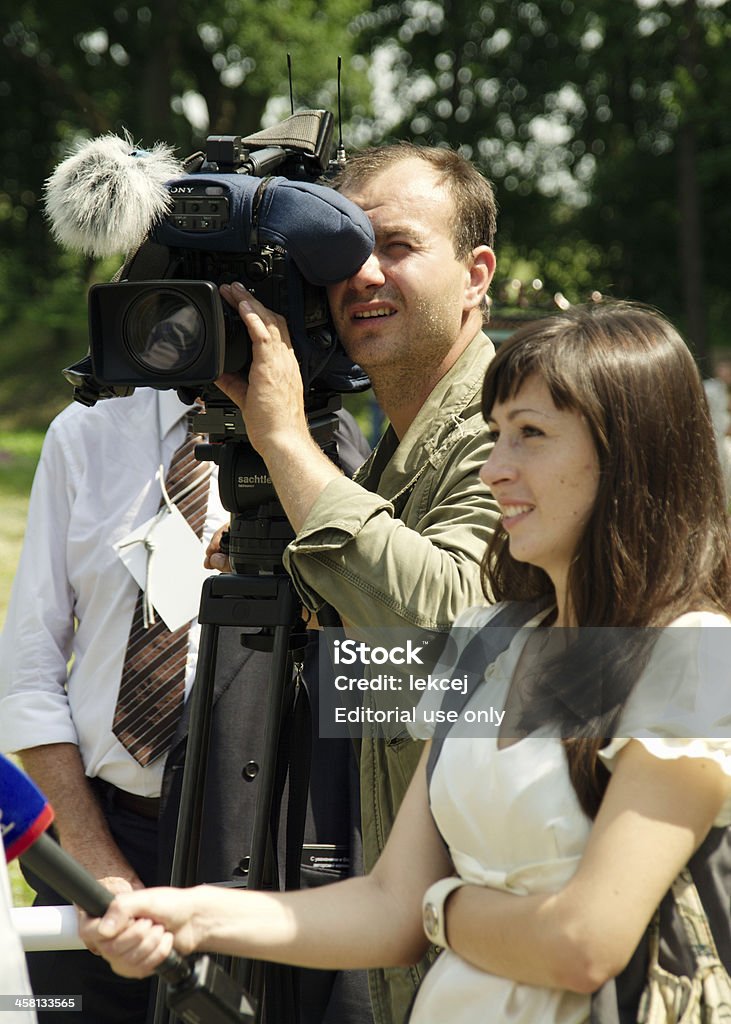 cameraman et correspondant - Photo de Entretien libre de droits