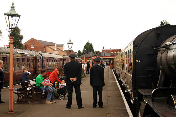 Railway guards on the station platform stock photo