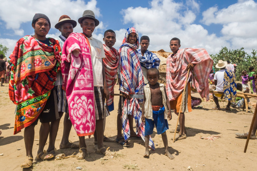 Itampolo, Madagascar - October 19, 2006: Group of Malagasy men of ethnic Antandroy in the weekly market.