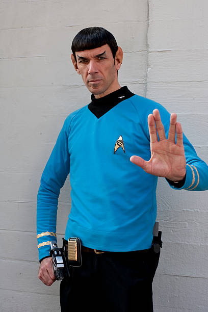 Spock Impersonator "Hollywood, USA - June 10, 2011: A celebrity impersonator poses for tourists as 'Spock' from 'Star Trek' on Hollywood Blvd on June 10, 2011 in Hollywood, CA." vulcan salute stock pictures, royalty-free photos & images