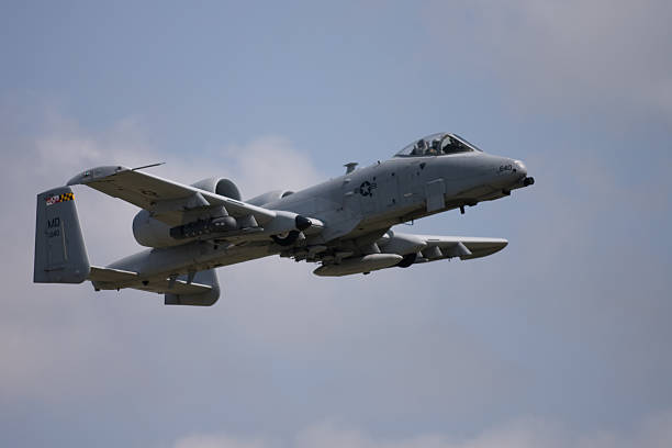 A-10 Attack Aircraft "St. Thomas, Canada - June 26, 2011. A Fairchild Republic A-10 Thunderbolt II attack aircraft in flight at the Great Lakes International Air Show." a10 warthog stock pictures, royalty-free photos & images