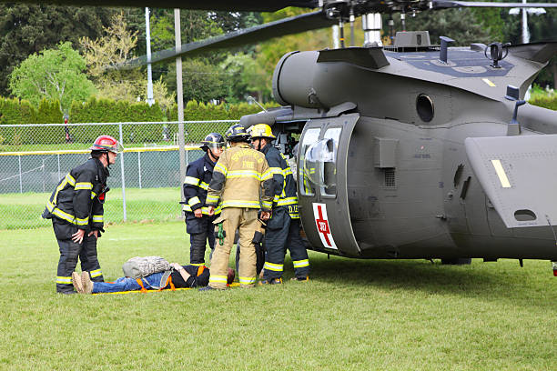 Catastrophe exercice discuter de chargement en hélicoptère - Photo