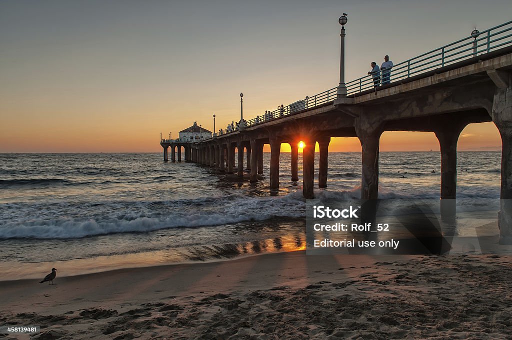 Ao pôr do sol att Manhattan Beach, LA - Foto de stock de Pier da Praia de Manhattan royalty-free