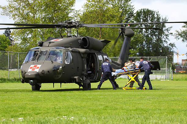 Catastrophe exercice chargement en hélicoptère Gurney gauche - Photo