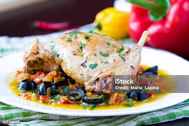 Ragout From Stewed Legs Of Rabbit With Herbs Vegetables Olive Stock Photo - Download Image Now