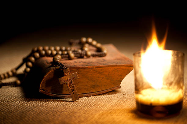 istock Holy Bible and Rosary Beads 458146541