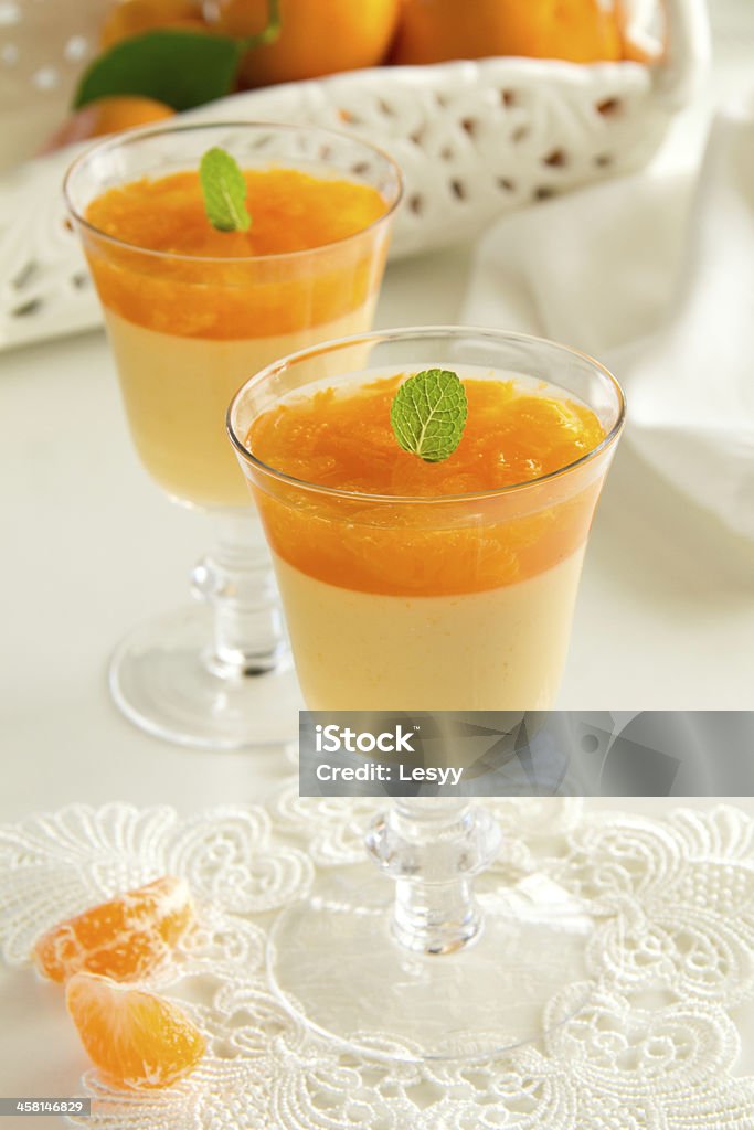 orange panna cotta with slices of oranges. Breakfast Stock Photo