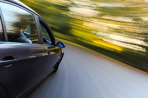 istock Side view of sedan in turn. 458147091