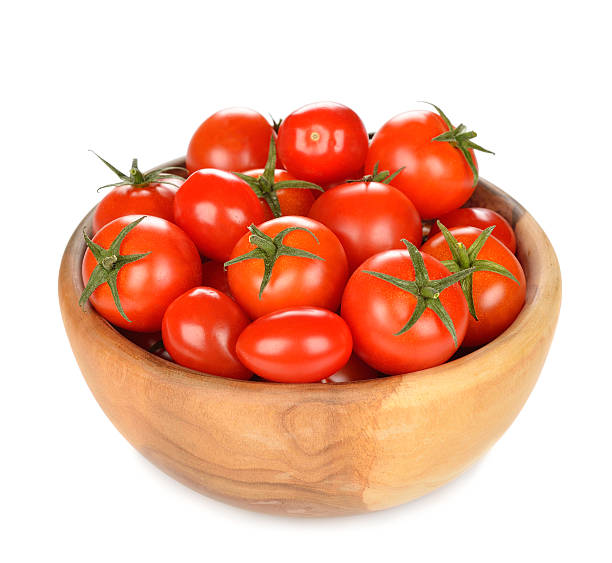 istock Tomatoes in a wooden bowl 458217671