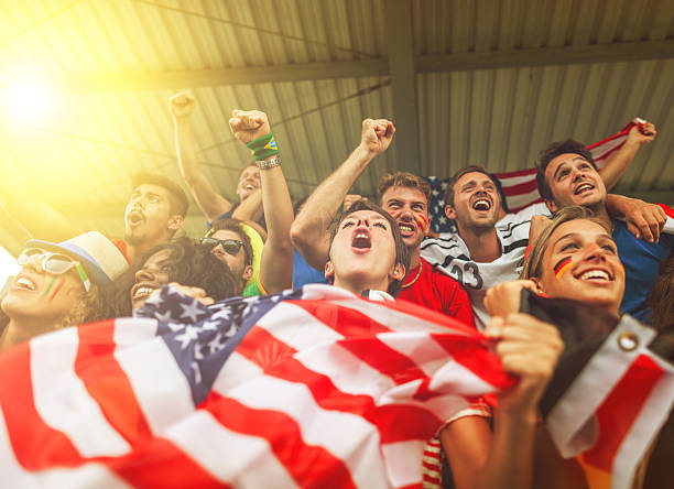 istock Group of different nations supporters together 458223727