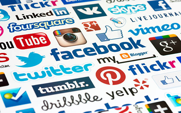 Social Media Logotype Background Kiev, Ukraine - October 19, 2012: A logotype collection of well-known social media brand's printed on paper. Include Facebook, YouTube, Twitter, Google Plus, Instagram, Vimeo, Flickr, Myspace, Tumblr, Livejournal, Foursquare and more other logos. internet fame stock pictures, royalty-free photos & images