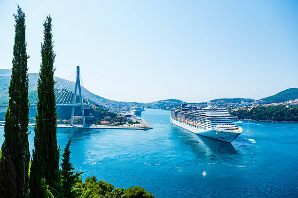 Dubrovnik, Croatia - July 26, 2013: A cruise ship MSC Divina approaching Cruise Port of Dubrovnik in Dubrovnik, Croatia on it's 7 nights East Mediterranean cruise. It is owned by MSC Cruises. It can host up to 3,959 passengers.
