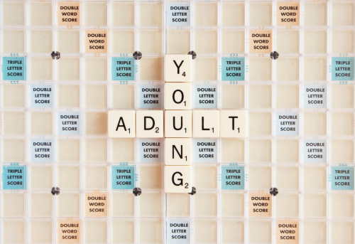 Veliko Tarnovo, Bulgarian - November 27, 2011: Adult and young written on the Scrable board