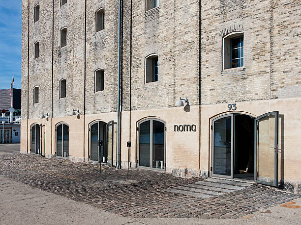 Best restaurant in the world Conepenhagen, Denmark - August 29, 2012: Copenhagen's Noma is named the The World's Best Restaurant 2012 and The Best Restaurant in Europe 2012 award because it's ground-braking approach to cooking. It is a restaurant of extraordinary pedigree so you have to reserve a dinner few months ahead. book title stock pictures, royalty-free photos & images