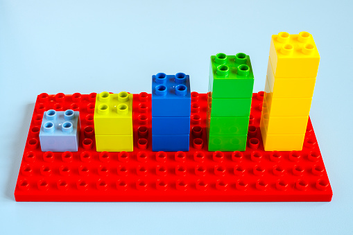 Borgosesia, Italy - January 5, 2013: Multicoloured bar graph made with Lego construction blocks Duplo series.