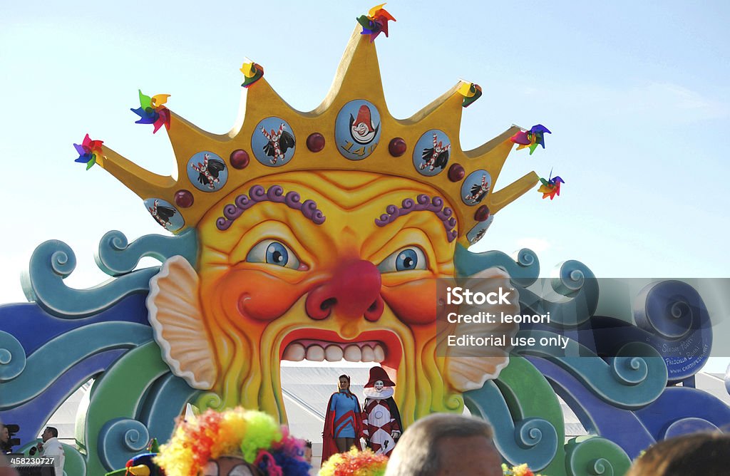 Carnival of Viareggio, main stage Viareggio, Italy - February 10, 2013: Carnival of Viareggio, colorful decorated main stage like big carnival mask with presenters on famouse carnival of Viareggio. The Viareggio Carnival is one of the most famous carnivals in Italy and Europe.Viareggio carnival floats its giant paper mache floats representing caricatures of popular characters, politicians. Viareggio Stock Photo